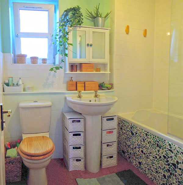 budget bathroom refit with seaglass bath panel