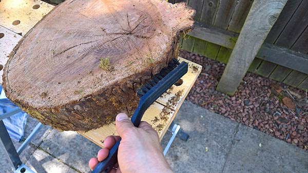 scrubbing loose material from log stools
