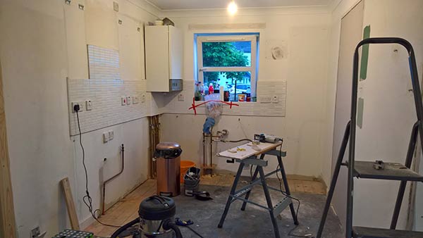 stripping out existing kitchen units for new kitchen installation