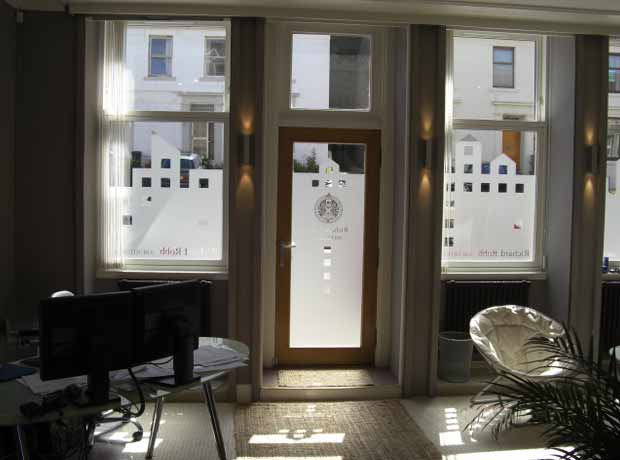 interior of architects studio with branded glass