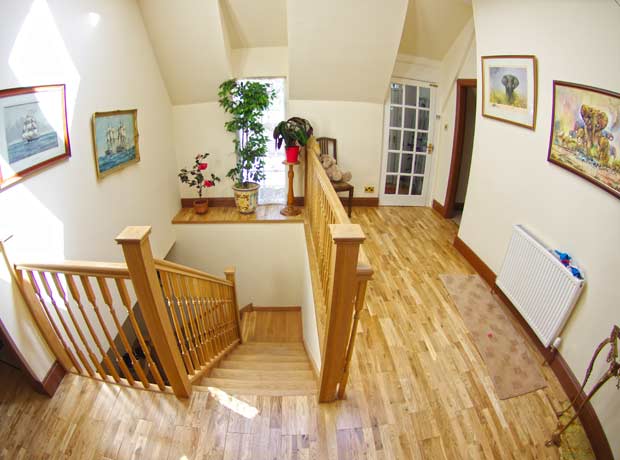 opened up hallway with new stairway and roof skylight